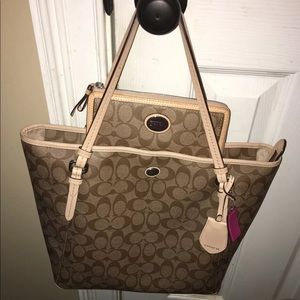 Coach shoulder bag with wallet.